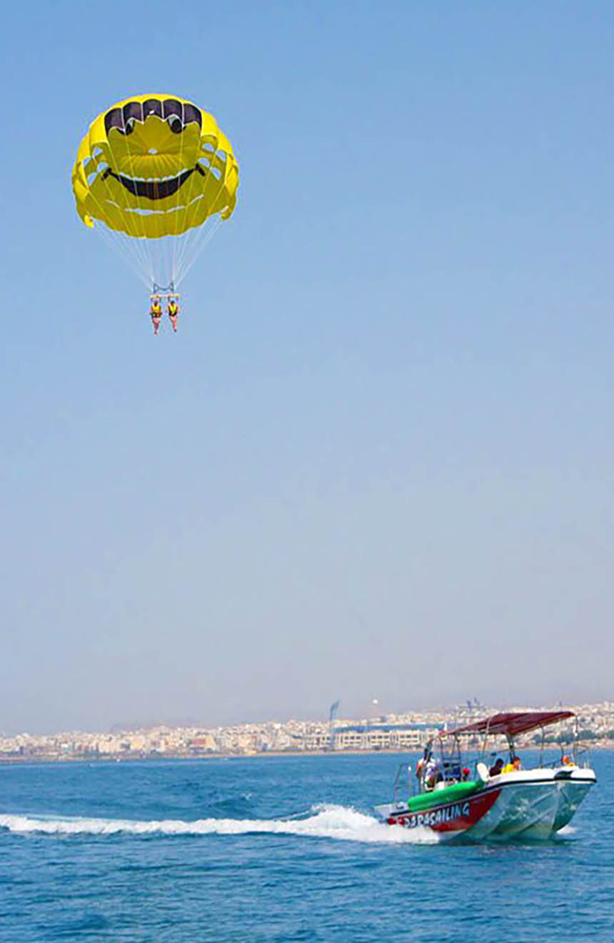 Activities in Agia Pelagia - Things to Do and Places to Visit! 18 parasailing in Agia Pelagia Heraklion Crete 860x1320 1